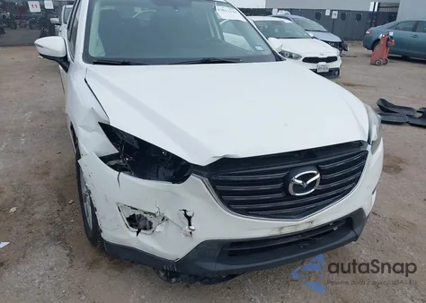 2016 Mazda Cx-5 Sport from USA, damaged, VIN JM3KE2BY2G0887983